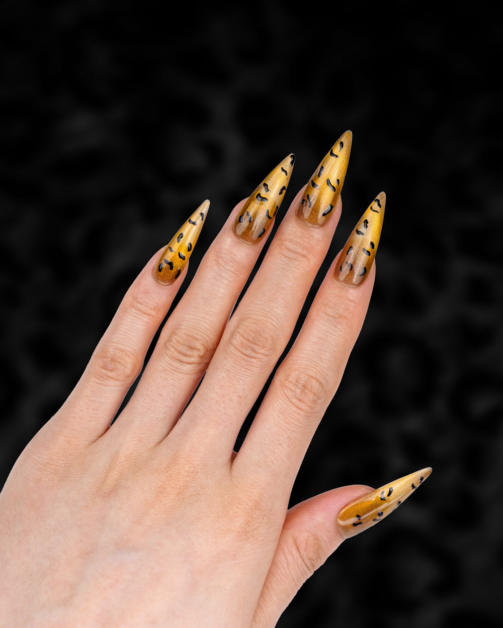 Side View of Model Wearing Paw Pal Tiger Cat Eye Extra Long Press-On Nails | Elegant Fake Nails for Women