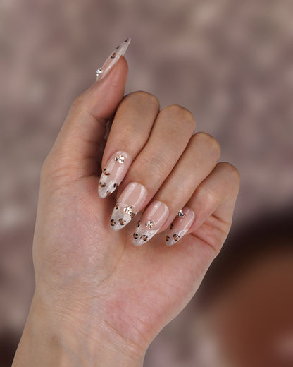 Model wearing Paw Pal Silver Leopard Long Press-On Nails – Fashionable & Durable Fake Nails