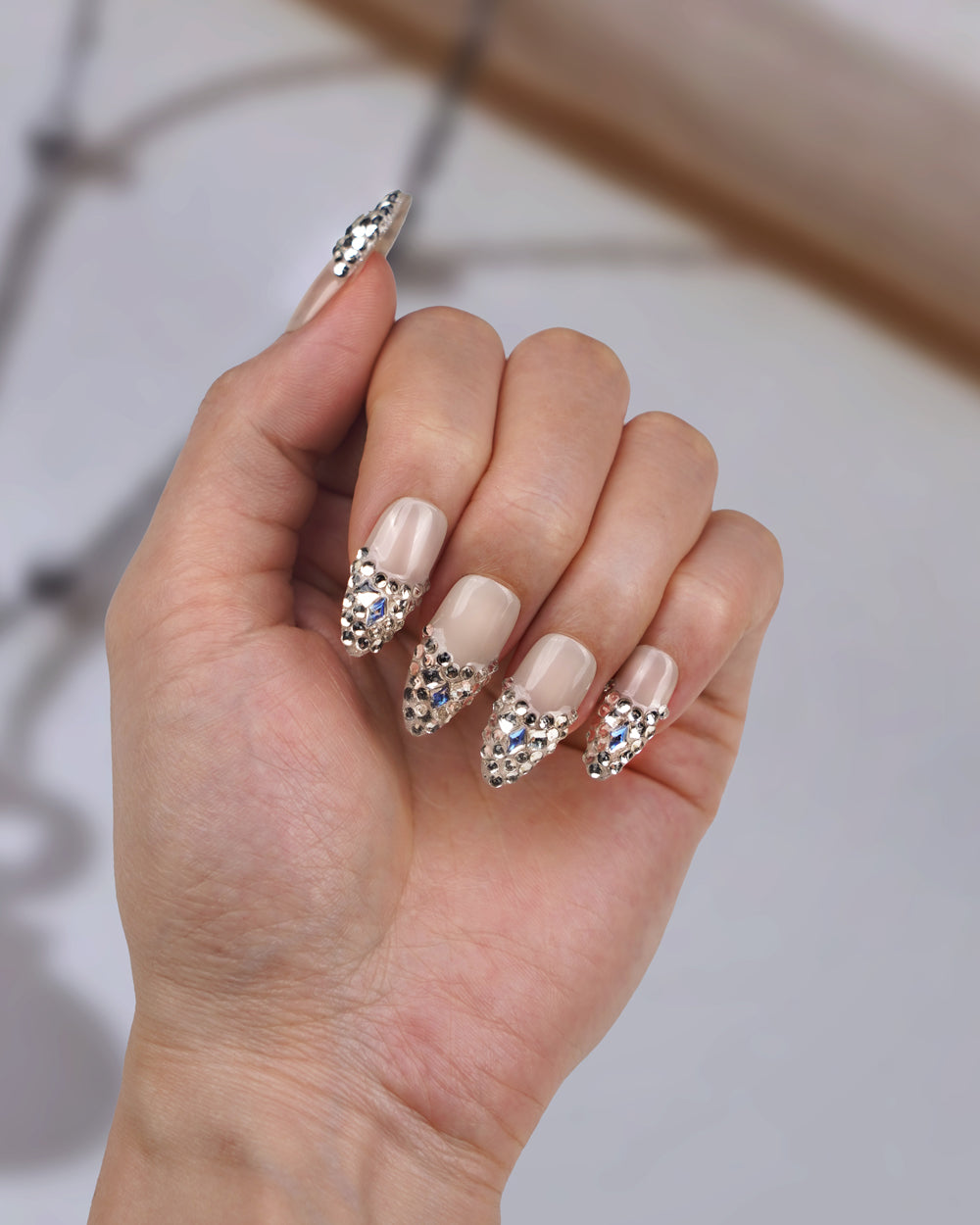 Hand model wearing Sparkle Grace Diamond Skirt Long Press-On Nails - Fashionable, Reusable & Durable