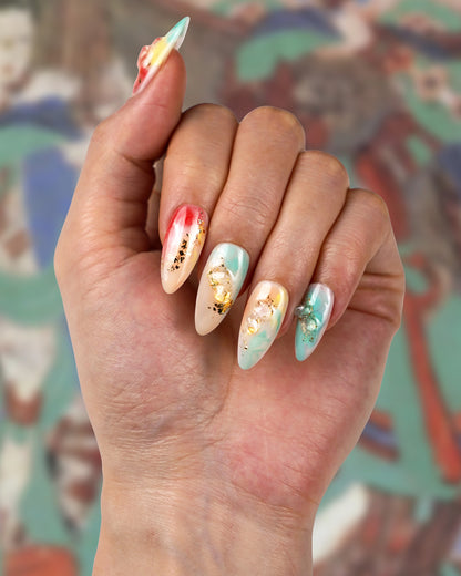 Model wearing Oriental Dunhuang Memory Long Press-On Nails – Handcrafted, Durable Fake Nails with Cultural Design