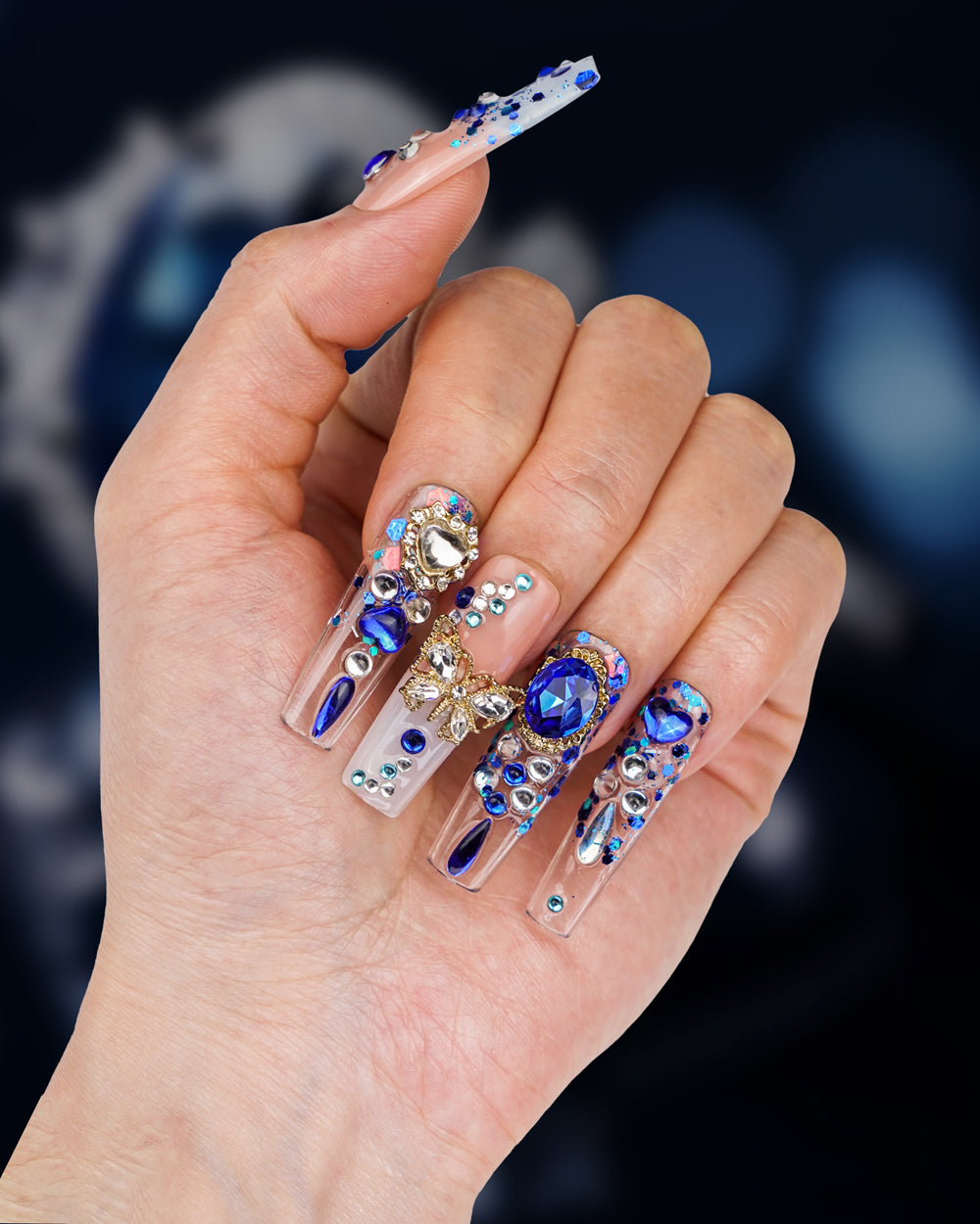 Hand model wearing Versailles Mysterious Blue Super Long Press-On Nails - Fashionable & Durable